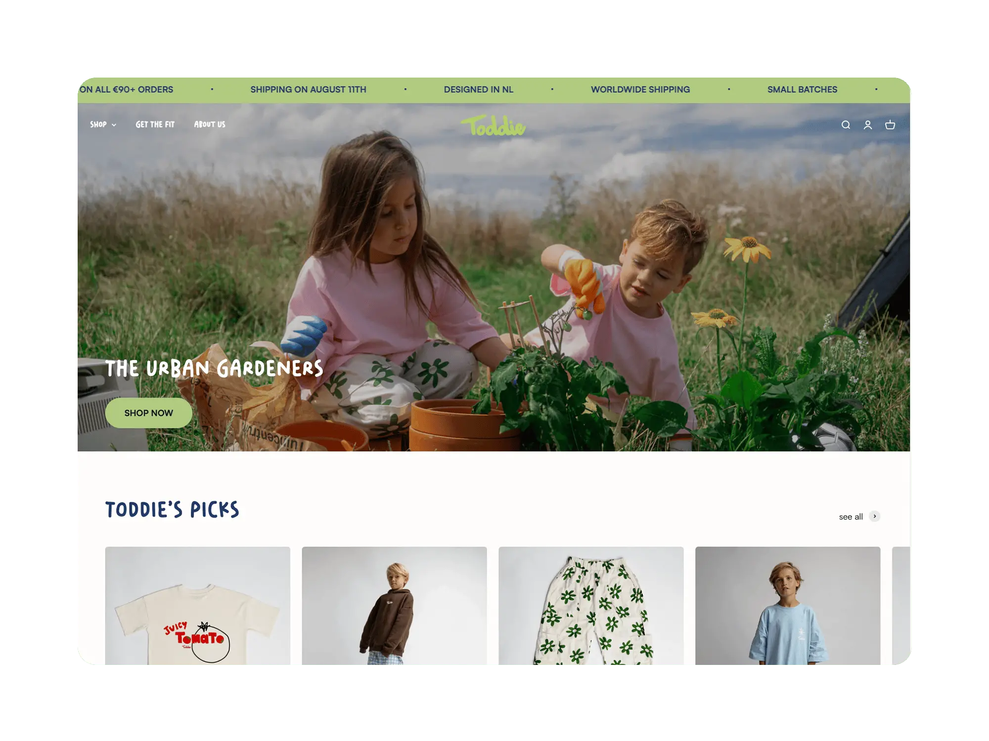 full‑width banner of two kids gardening, sitewide promo bar and Toddie logo above, “The Urban Gardeners” headline with “Shop Now” button.